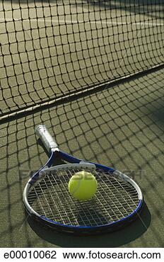 Stock Photo - tennis racket 
and ball on court. 
fotosearch - search 
stock photos, 
pictures, images, 
and photo clipart