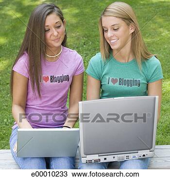 Banco de Imagem - adolescente,  
meninas,  blogging. 
fotosearch - busca 
de fotos, imagens 
e clipart