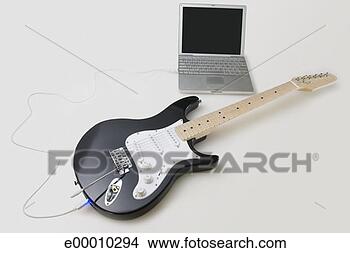 Stock Photo - electric guitar 
connected to laptop 
computer. fotosearch 
- search stock 
photos, pictures, 
images, and photo 
clipart