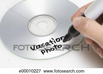 Foto - mão,  marcação, 
 férias,  cd. 
fotosearch - busca 
de fotos, imagens 
e clipart