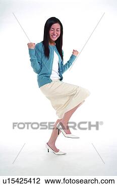 Stock Photo - young woman standing 
on one leg, in 
big happiness. 
fotosearch - search 
stock photos, 
pictures, images, 
and photo clipart