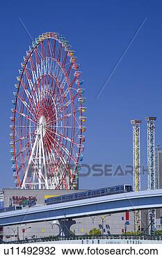 Stock Photo - odaiba ferris 
wheel and yurikamome 
railroad. fotosearch 
- search stock 
photos, pictures, 
images, and photo 
clipart