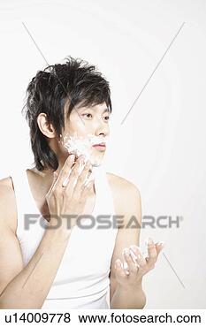 Banco de Imagem - jovem,  creaming, 
 barbear. fotosearch 
- busca de fotos, 
imagens e clipart