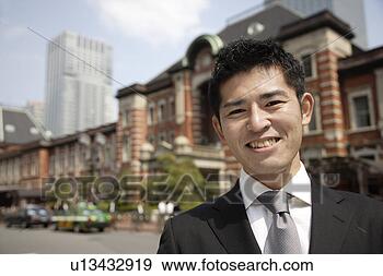 Stock Photograph - close-up of a 
smiling businessman. 
fotosearch - search 
stock photos, 
pictures, images, 
and photo clipart