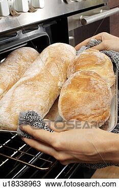 Stock Photo - woman in kitchen 
baking  italian 
bread. fotosearch 
- search stock 
photos, pictures, 
images, and photo 
clipart