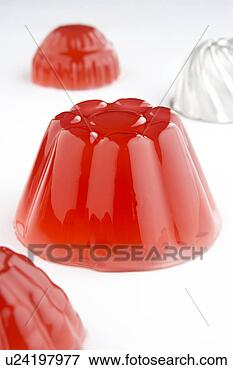 Foto - jogo,  geléias, 
 branca,  fundo, 
 metal,  moldes, 
 fundo. fotosearch 
- busca de fotos, 
imagens e clipart