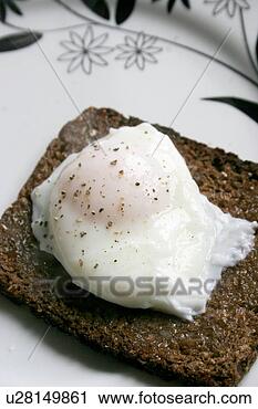 Arquivo de Fotografia - escalfado,  ovo, 
 marrom,  pão. 
fotosearch - busca 
de fotos, imagens 
e clipart