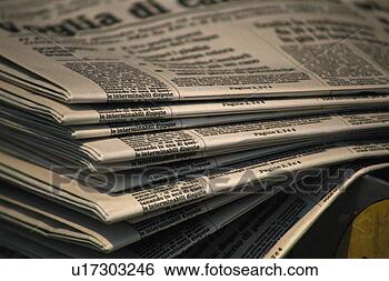 Stock Photo - close up image 
of piled newspaper, 
close up, differential 
focus. fotosearch 
- search stock 
photos, pictures, 
images, and photo 
clipart