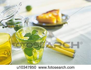 Arquivo de Fotografias - erva,  vidro, 
 fatias,  laranja, 
 azedo,  prato. 
fotosearch - busca 
de fotos, imagens 
e clipart