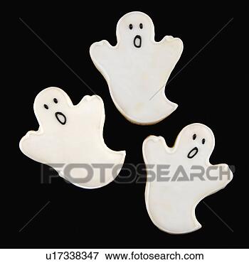 Picture - three sugar cookies 
in shape of ghosts 
with decorative 
icing. fotosearch 
- search stock 
photos, pictures, 
images, and photo 
clipart
