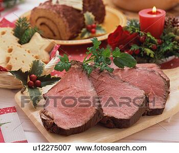 Picture - roast beef and 
christmas cake. 
fotosearch - search 
stock photos, 
pictures, images, 
and photo clipart