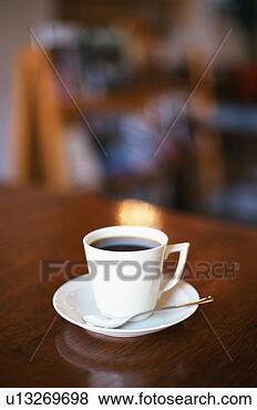 Stock Photo - coffee cup on 
table. fotosearch 
- search stock 
photos, pictures, 
images, and photo 
clipart