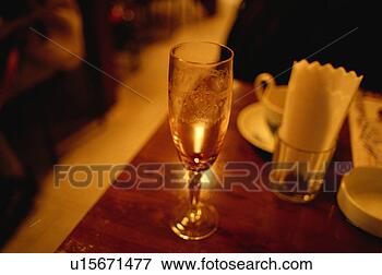 Picture - glass on a table. 
fotosearch - search 
stock photos, 
pictures, images, 
and photo clipart
