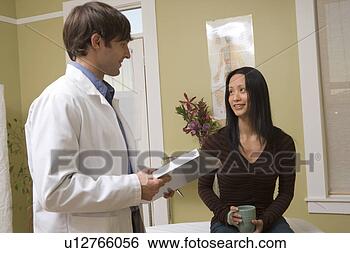 Stock Photo - doctor consulting 
with patient. 
fotosearch - search 
stock photos, 
pictures, images, 
and photo clipart