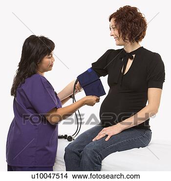 Banco de Imagem - grávida,  caucasiano, 
 mid-adulto,  
mulher,  tendo, 
 sangue,  pressão. 
fotosearch - busca 
de fotos, imagens 
e clipart