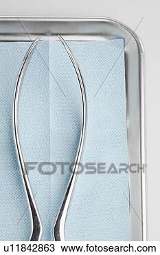 Stock Photo - medical instrument 
in stainless steel 
tray (close-up). 
fotosearch - search 
stock photos, 
pictures, images, 
and photo clipart