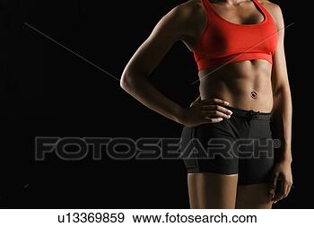 Stock Photograph - torso of muscular 
african american 
woman wearing 
athletic apparel. 
fotosearch - search 
stock photos, 
pictures, images, 
and photo clipart