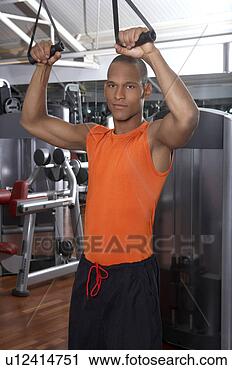 Arquivo de Fotografia - homem,  exercitar, 
 ginásio. fotosearch 
- busca de fotos, 
imagens e clipart