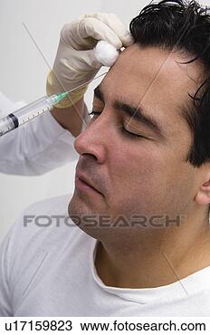 Banco de Imagem - homem,  obtendo, 
 botox. fotosearch 
- busca de fotos, 
imagens e clipart