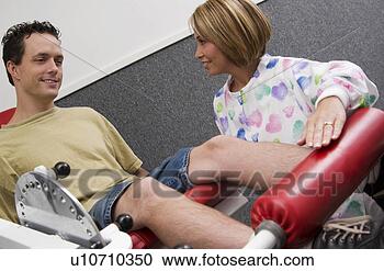 Stock Photography - man in physical 
therapy. fotosearch 
- search stock 
photos, pictures, 
images, and photo 
clipart