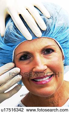 Stock Photo - woman having cosmetic 
surgery. fotosearch 
- search stock 
photos, pictures, 
images, and photo 
clipart