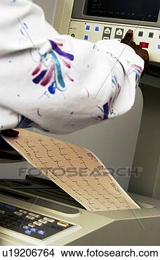 Stock Photo - african american 
technician monitoring 
ekg machine. fotosearch 
- search stock 
photos, pictures, 
images, and photo 
clipart