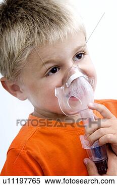 Stock Image - boy using breathing 
machine. fotosearch 
- search stock 
photos, pictures, 
images, and photo 
clipart