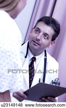 Stock Photo - physician consulting 
with patient. 
fotosearch - search 
stock photos, 
pictures, images, 
and photo clipart