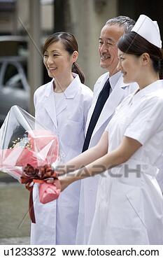 Banco de Imagem - doutores,  enfermeira, 
 sorrindo. fotosearch 
- busca de fotos, 
imagens e clipart