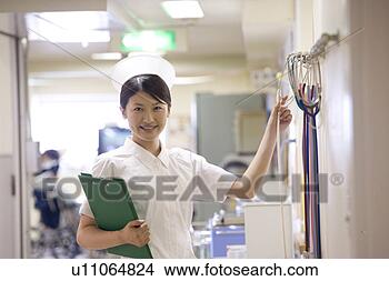 Banco de Imagem - femininas,   enfermeira, 
  verificar,  
 stethoscopes, 
  enfermeira. 
fotosearch - busca 
de fotos, imagens 
e clipart