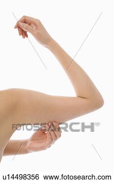 Banco de Imagem - mulher,  beliscando, 
 braço. fotosearch 
- busca de fotos, 
imagens e clipart