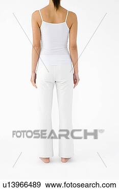 Arquivo Fotográficos - mulher,  ficar, 
 parte traseira, 
 vista. fotosearch 
- busca de fotos, 
imagens e clipart