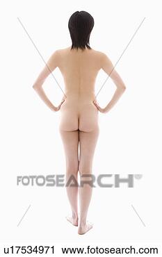 Arquivo de Fotografia - mulher,  ficar, 
 parte traseira, 
 vista. fotosearch 
- busca de fotos, 
imagens e clipart