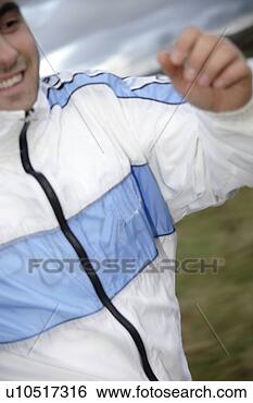 Banco de Imagem - jovem,  sacudindo, 
 rancor,  mau, 
 tempo. fotosearch 
- busca de fotos, 
imagens e clipart
