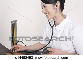 Banco de Imagem - enfermeira,  medindo, 
 sangue,  pressão. 
fotosearch - busca 
de fotos, imagens 
e clipart