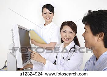 Banco de Imagem - doutor,  explicando, 
 monitor. fotosearch 
- busca de fotos, 
imagens e clipart