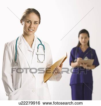 Stock Photo - caucasian mid-adult 
female doctor 
smiling and looking 
at viewer with. 
fotosearch - search 
stock photos, 
pictures, images, 
and photo clipart