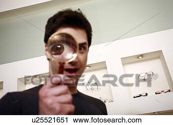 Arquivo de Fotografia - magnificar,  vidro, 
 olho. fotosearch 
- busca de fotos, 
imagens e clipart