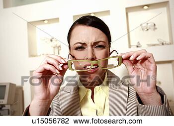 woman-eyeglasses-squinting_~u15056782.jpg