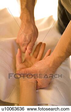 Stock Photo - hand massage. 
fotosearch - search 
stock photos, 
pictures, images, 
and photo clipart