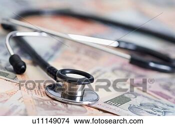 Stock Photo - stethoscope on 
indian banknotes 
of different denominations. 
fotosearch - search 
stock photos, 
pictures, images, 
and photo clipart