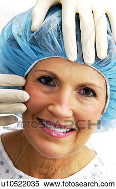 Stock Image - woman having cosmetic 
surgery. fotosearch 
- search stock 
photos, pictures, 
images, and photo 
clipart