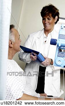 Stock Photo - doctor talking 
with patient doctor 
talking with patient. 
fotosearch - search 
stock photos, 
pictures, images, 
and photo clipart
