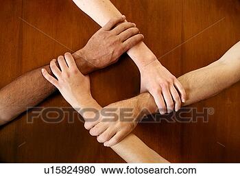 Stock Photography - four arms locked 
together at the 
wrists. fotosearch 
- search stock 
photos, pictures, 
images, and photo 
clipart