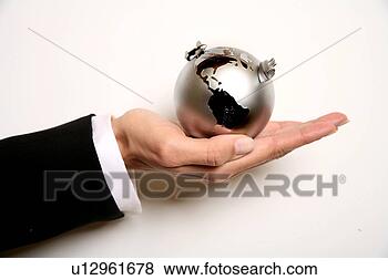 Stock Photo - a woman holding 
a globe. fotosearch 
- search stock 
photos, pictures, 
images, and photo 
clipart
