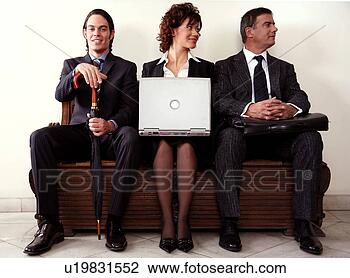 Stock Photo - three people sitting 
in a waiting room. 
fotosearch - search 
stock photos, 
pictures, images, 
and photo clipart