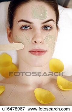 Picture - woman having a 
facial treatment 
in a spa. fotosearch 
- search stock 
photos, pictures, 
images, and photo 
clipart