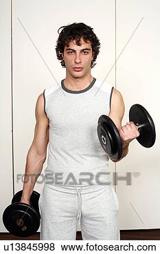Banco de Imagem - jovem,  homem, 
 levantamento, 
 pesos. fotosearch 
- busca de fotos, 
imagens e clipart