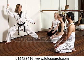 Stock Photo - students observing 
dantae demonstration. 
fotosearch - search 
stock photos, 
pictures, images, 
and photo clipart