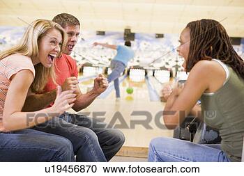 Stock Photography - man bowling with 
friends. fotosearch 
- search stock 
photos, pictures, 
images, and photo 
clipart